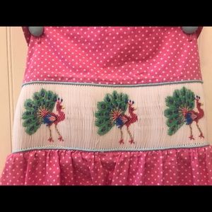 Pink smocked peacock dress size 7